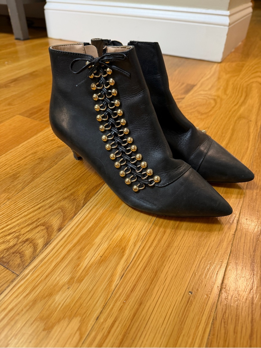 Kurt Geiger Black Leather Pointed-Toe Ankle Boots with Gold Stud Lace Detail